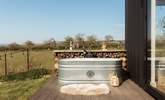 Relax in the outdoor bath tub surrounded by nature.  - Thumbnail Image