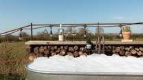 Take a relaxing dip in the outdoor urban bathtub come morning or evening.