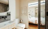 The bathroom resides between the main living space and the bedroom.  - Thumbnail Image