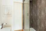 And has charming sliding doors for your privacy.