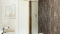 And has charming sliding doors for your privacy.