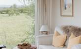 The neutral tones create a calming space.  - Thumbnail Image