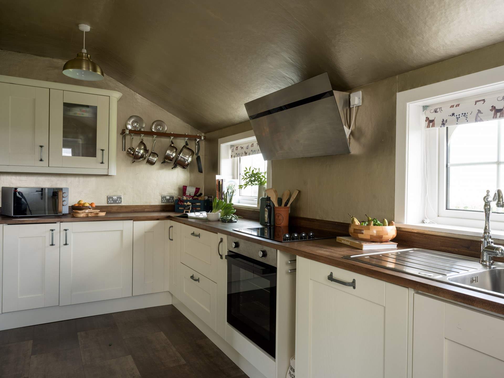 The contemporary styled kitchen has everything you need and amazing views too.