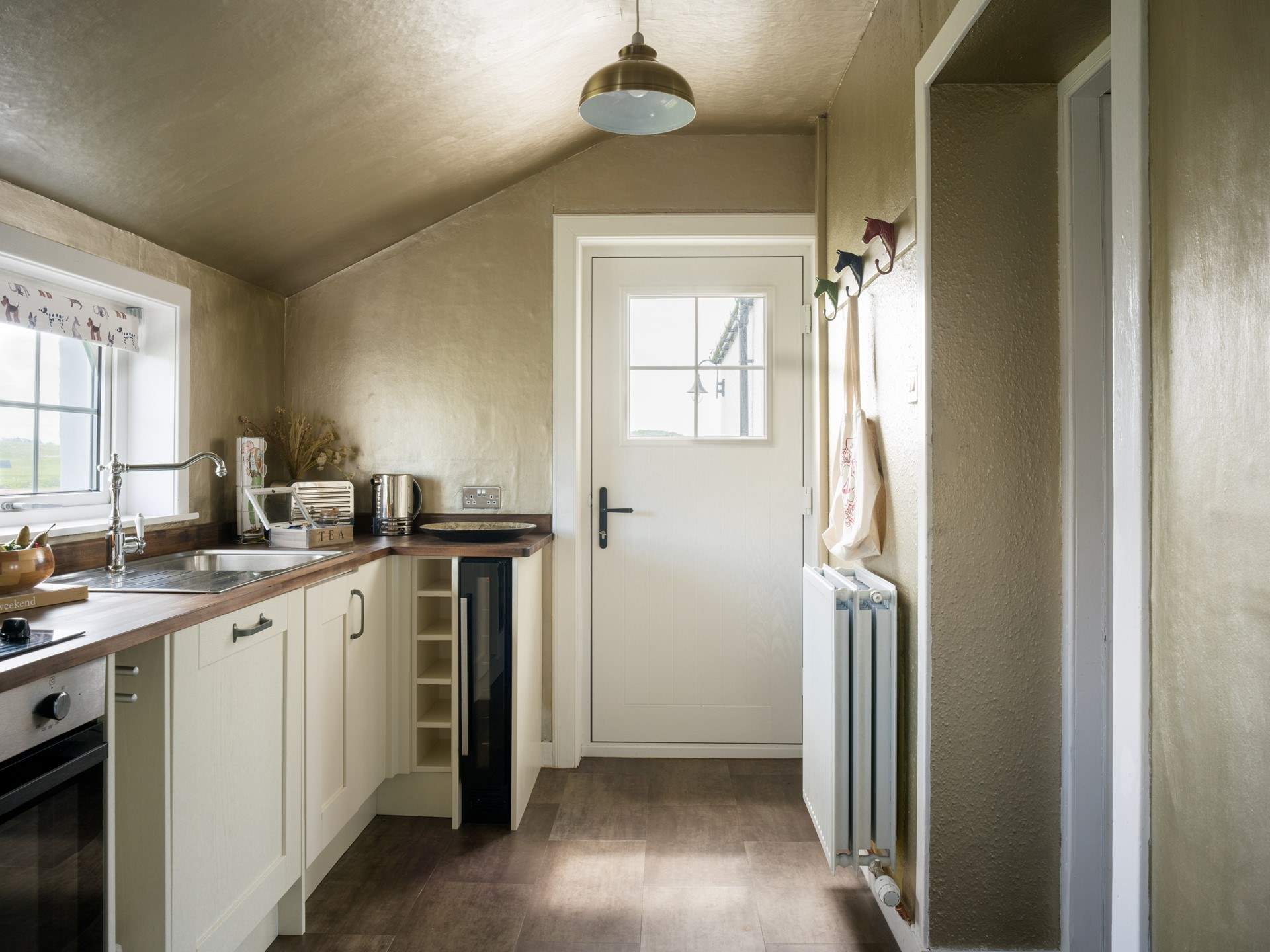 The kitchen has a wine cooler for your favourite tipple. 