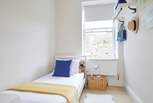 The comfortable single bedroom...