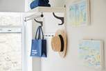 Somewhere to hang your belongings in the single bedroom.