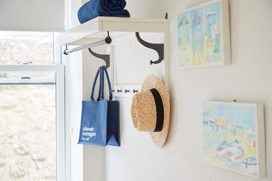 Somewhere to hang your belongings in the single bedroom.