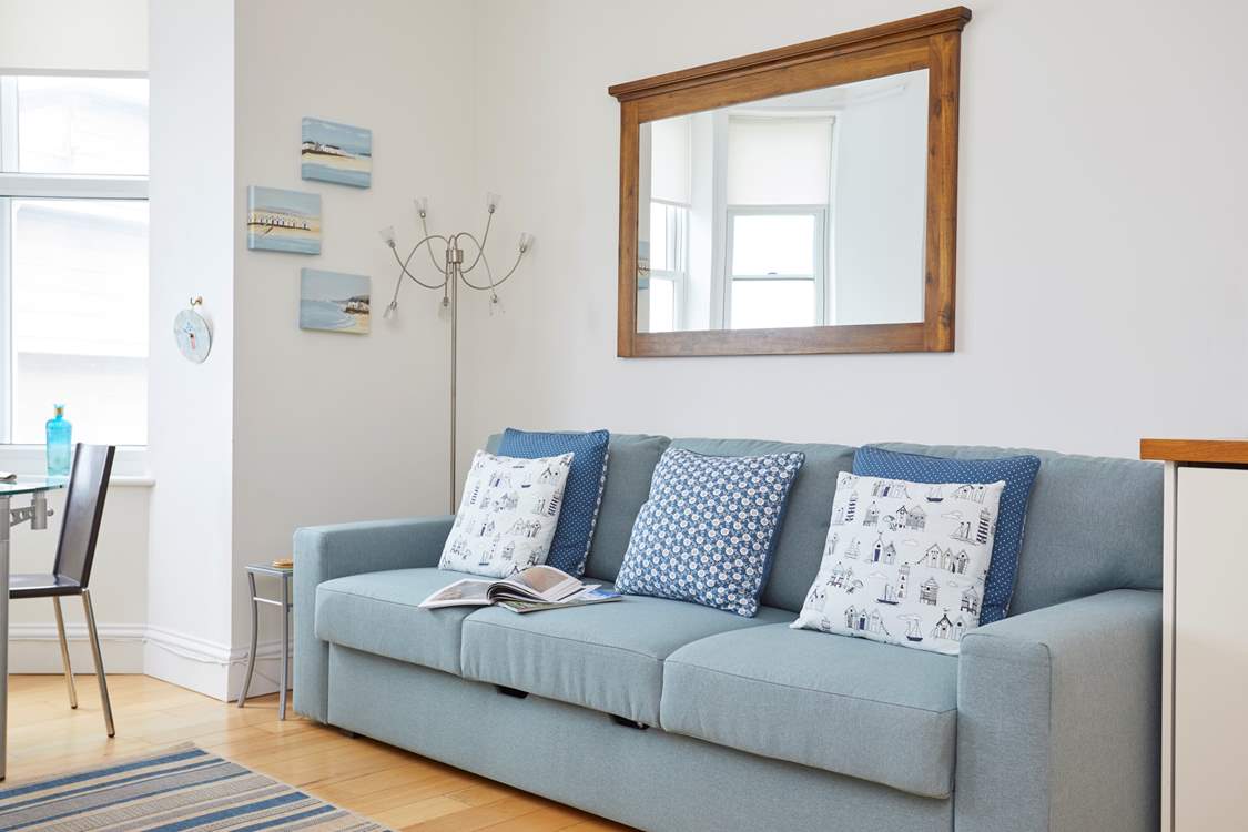 Cosy up to an evening film of your choice, or just sit back and admire the sea view!