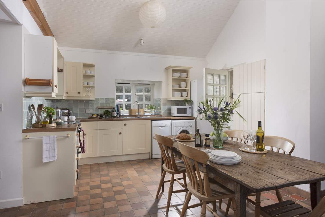 Step into the kitchen/dining-room and make yourself at home.
