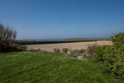 From the end of the garden you can look out across the countryside to the sea.