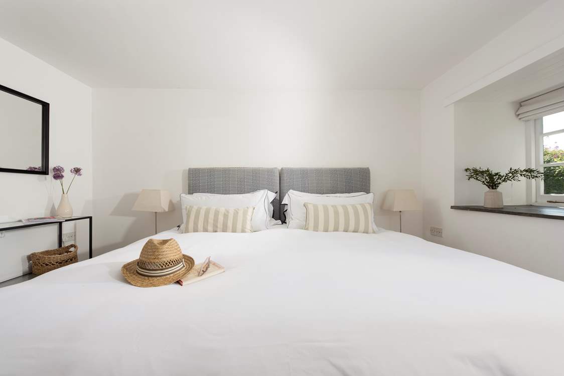 A huge Emperor bed awaits in bedroom 1.