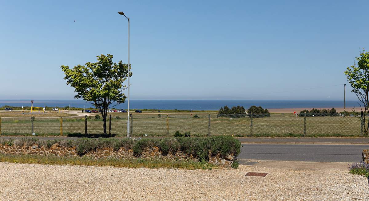 Stunning sea views across the 'Pitch and Putt' course from the vast driveway at Honeystones.