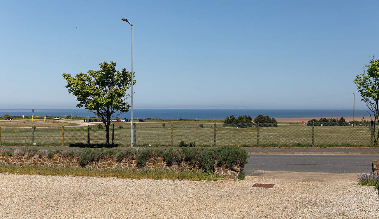 Stunning sea views across the 'Pitch and Putt' course from the vast driveway at Honeystones.