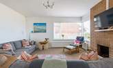 Relax in the comfy sitting-room. - Thumbnail Image