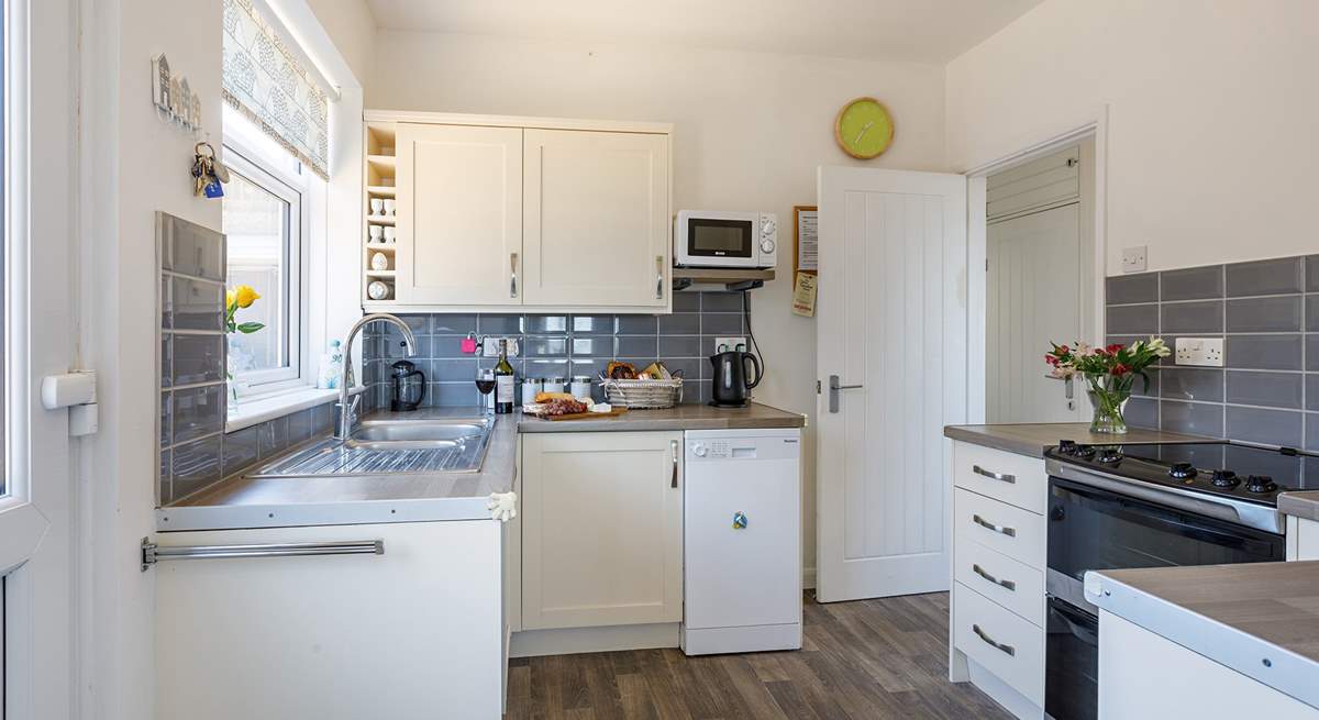Cook up a feast in the well-equipped kitchen.