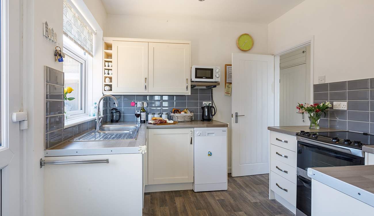 Cook up a feast in the well-equipped kitchen.