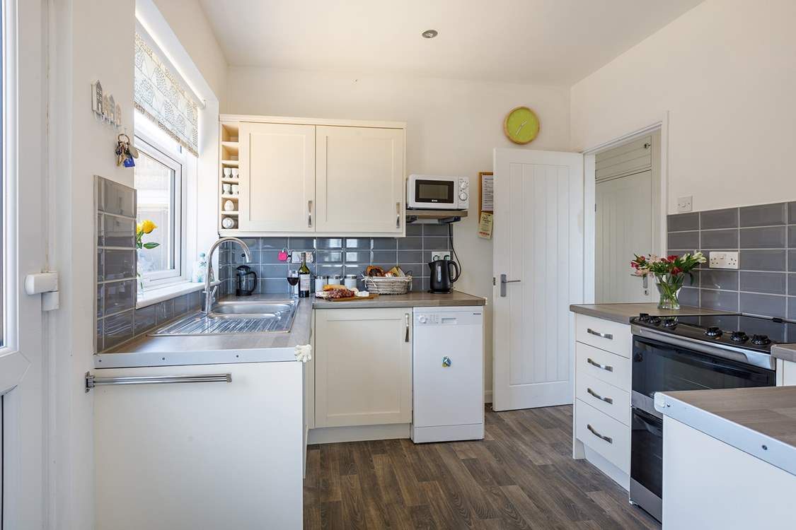 Cook up a feast in the well-equipped kitchen.