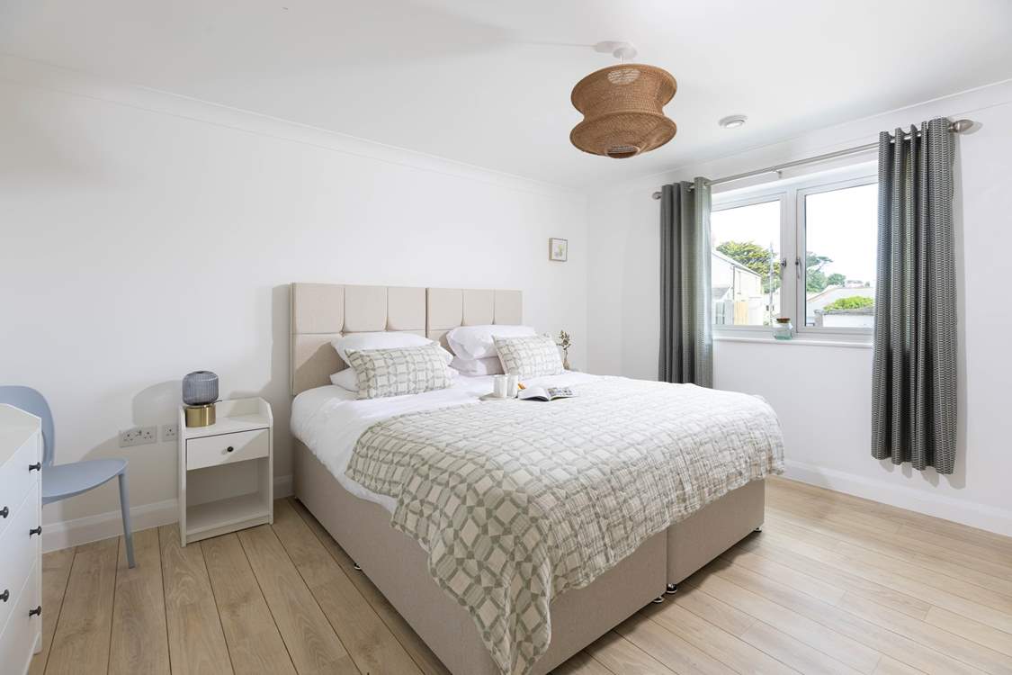 A super-king 'zip and link' bedroom is the first of six bedrooms, this one is located on the ground floor.