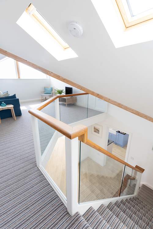 Head upstairs to bedroom 6 and a sweet snug.