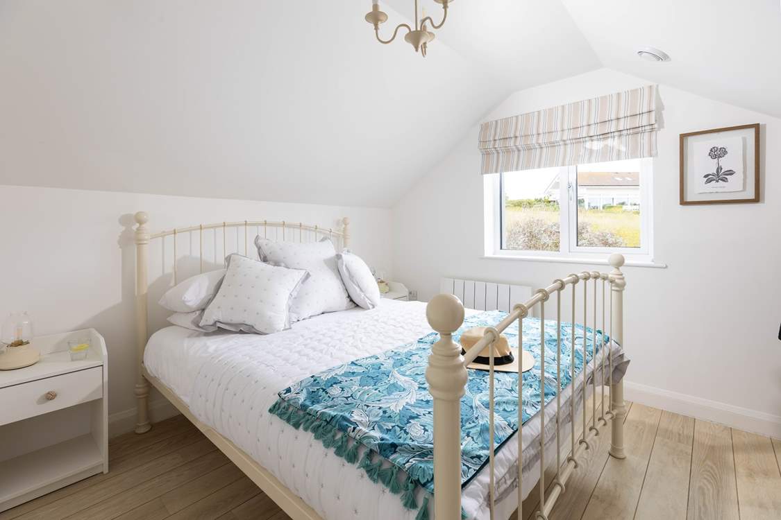 Bedroom 6 a stunning double tucked away at the top of this lovely home.