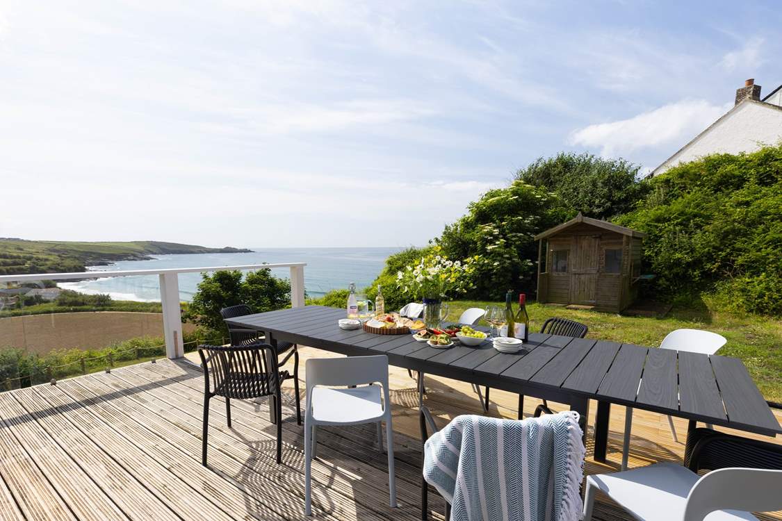 Head out onto the terrace from the luxury kitchen and admire the gardens and rolling waves. You will see the surfers and swimmers in the sea below.