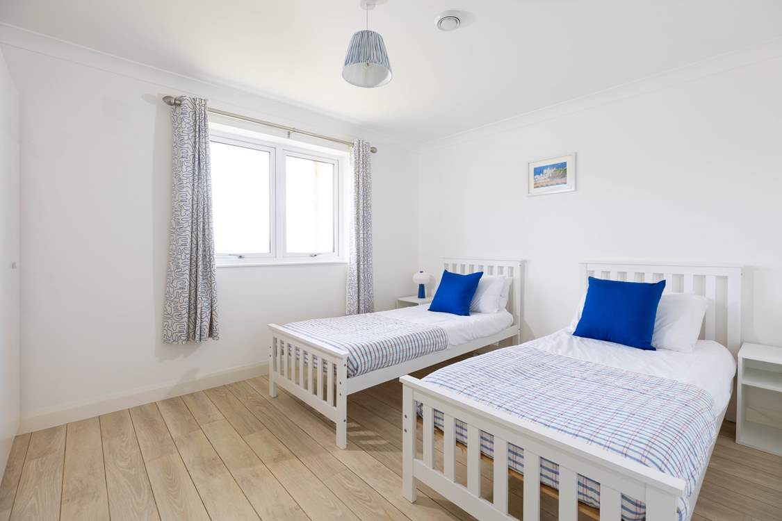 Bedroom 5 is another cute twin.
