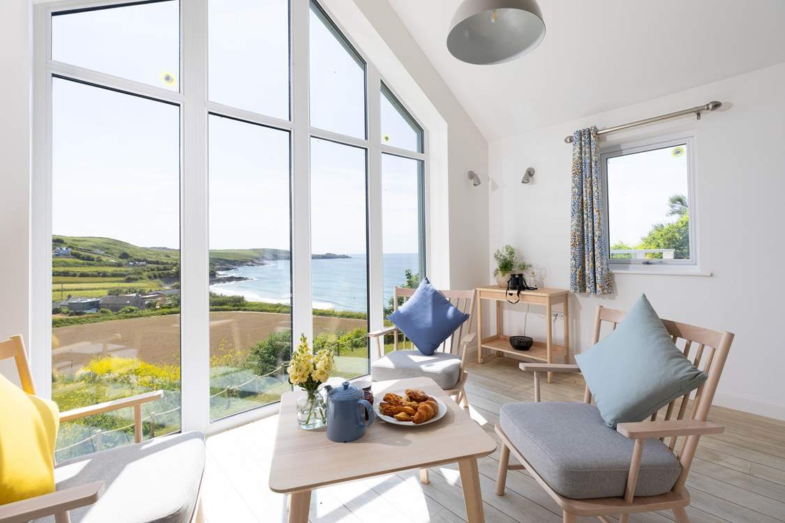 Enjoy breakfast in the kitchen with a view of rolling fields and sweeping sea.