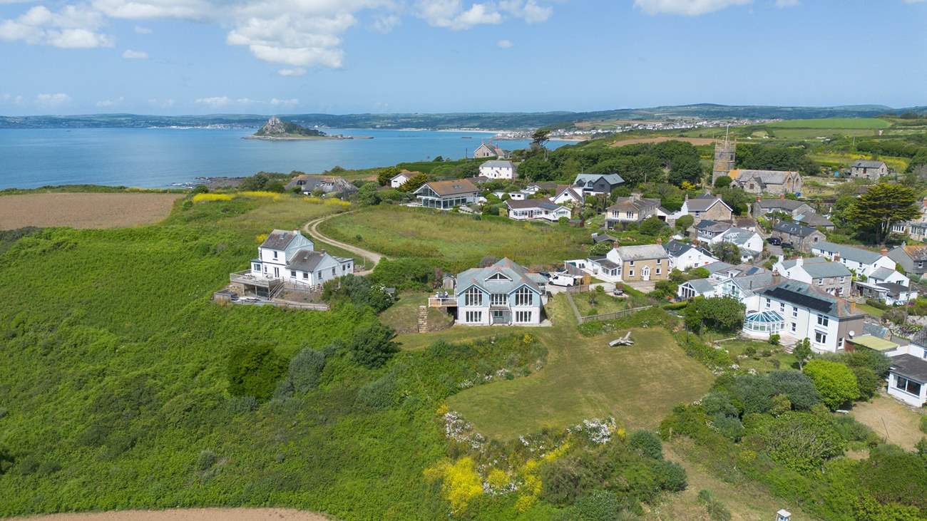An aerial shot of this prestigious property showing the huge garden in front of the home.
