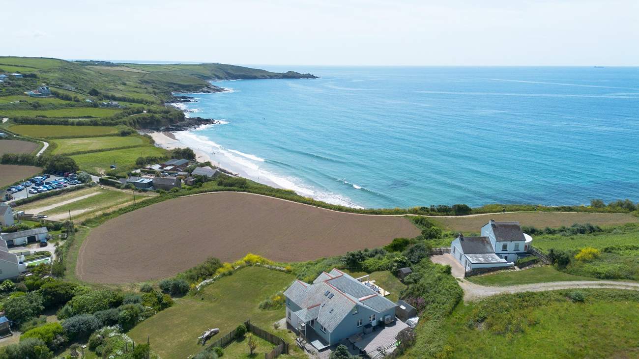 The sandy beach is just a few minutes walk from the home.