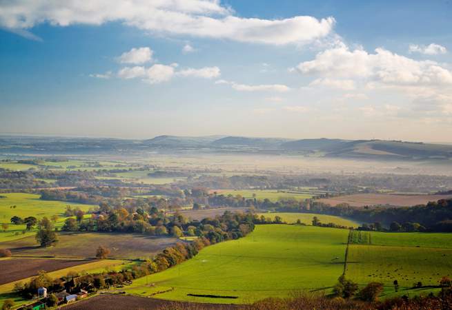 Discover breathtaking views at Chanctonbury Ring, just 20 minutes away.
