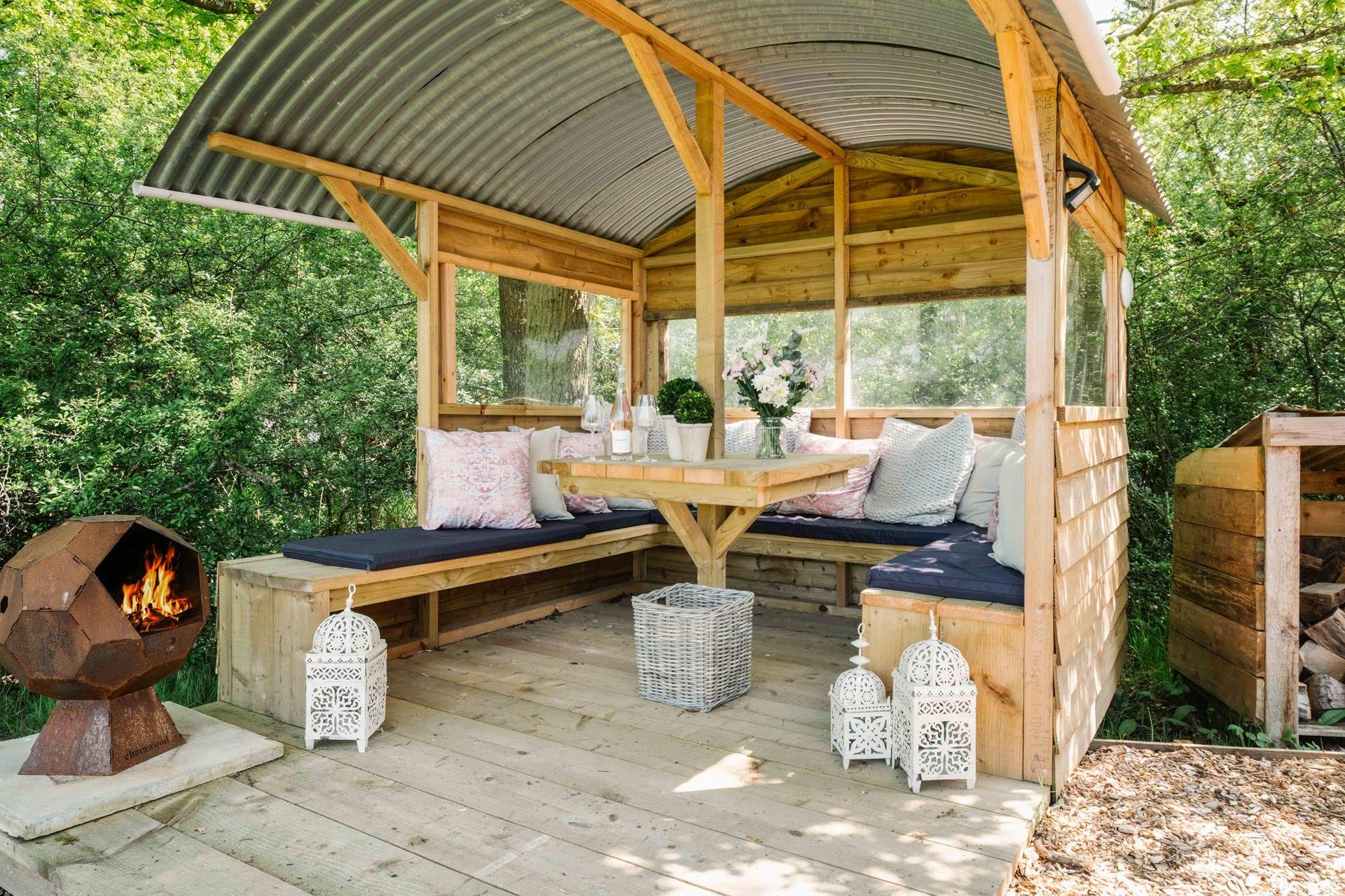 Light the fire-pit, sit back, and relax in the gorgeous outdoor seating area. 