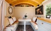 The bed folds up against the wall to reveal the lovely indoor dining space.  - Thumbnail Image