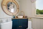 The luxurious interiors flow through to the en-suite shower room. 