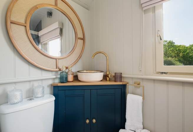 The luxurious interiors flow through to the en suite shower-room. 