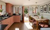 The spacious kitchen/dining-room is just the place to gather for memorable meals. - Thumbnail Image