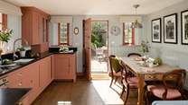 The spacious kitchen/dining-room is just the place to gather for memorable meals.