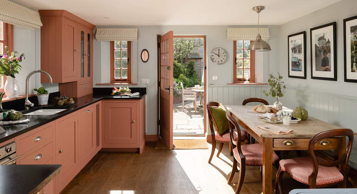 The spacious kitchen/dining-room is just the place to gather for memorable meals.