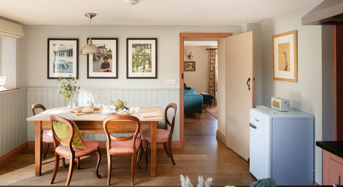 The lovely old farmhouse table sets the scene for family gatherings. 