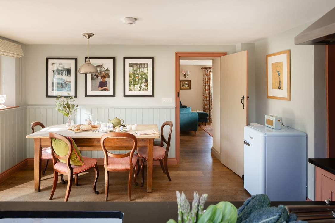 The lovely old farmhouse table sets the scene for family gatherings.