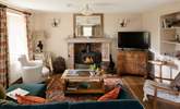 The sitting-room is cosy in any season.  - Thumbnail Image