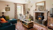 The comfy sofa and chairs entice you to sit back and relax, read one of the many books or play a board game, no cheating!