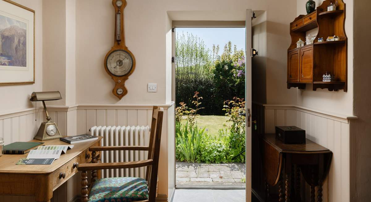 Do you need to do a little work? The study-area is perfect and in the sunshine couldn't be a better spot, the garden will call you outside though!