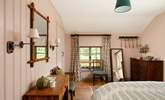 Country cottage style is evident throughout this gorgeous cottage.  - Thumbnail Image