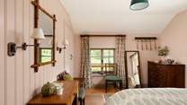 Country cottage style is evident throughout this gorgeous cottage. 