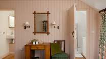 Bedroom 1 has an en suite shower-room and separate WC. 