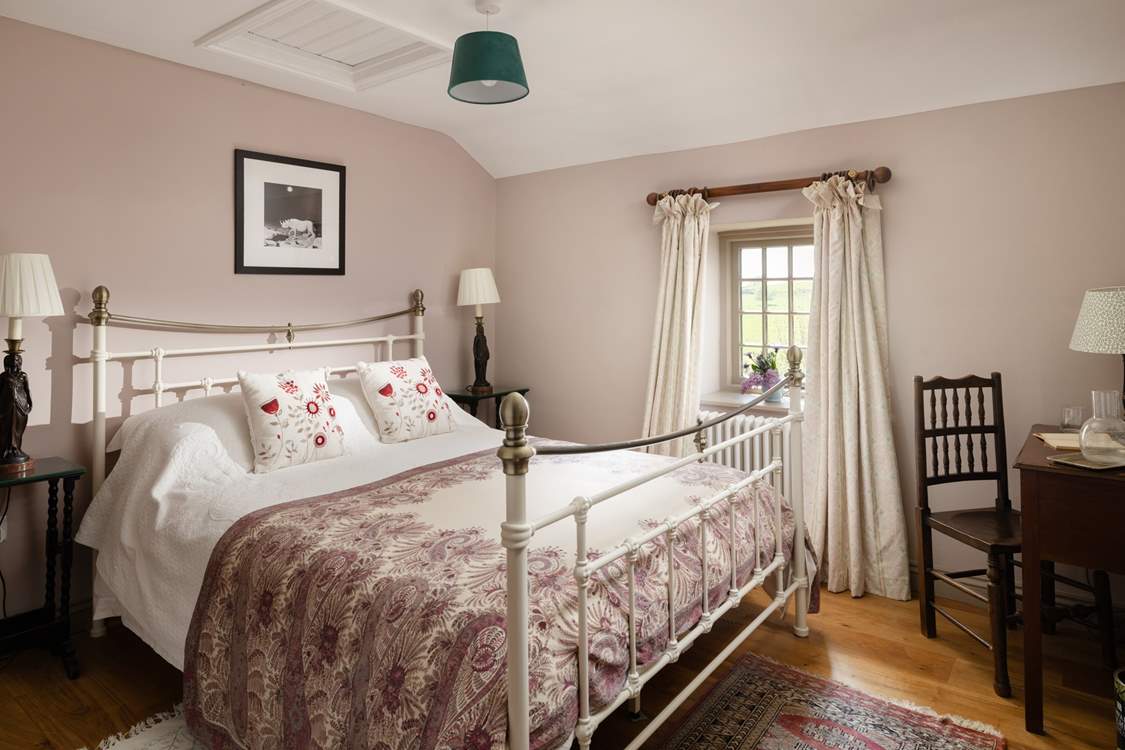 Sumptuous linens and soft furnishings grace the cottage.