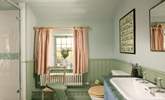 The bathroom has both a shower cubicle and a bath, take your pick.  - Thumbnail Image