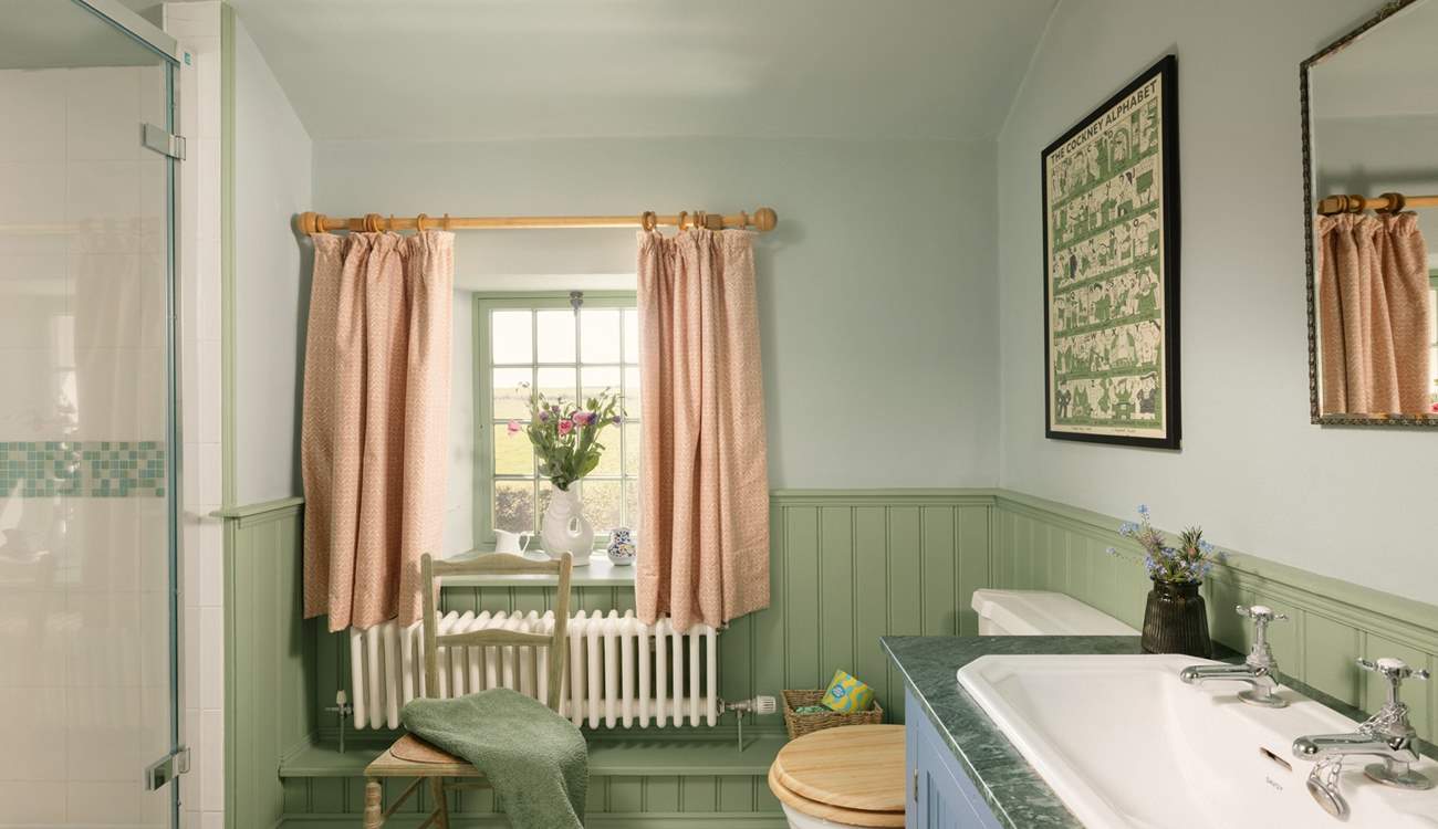 The bathroom has both a shower cubicle and a bath, take your pick. 