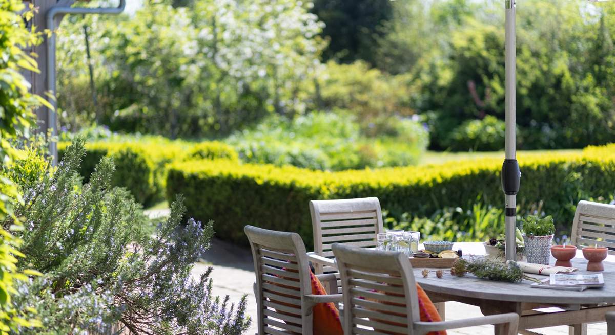 Sit amongst the beautiful borders and enjoy a relaxing meal and listen to the surrounding rustle of the trees. 