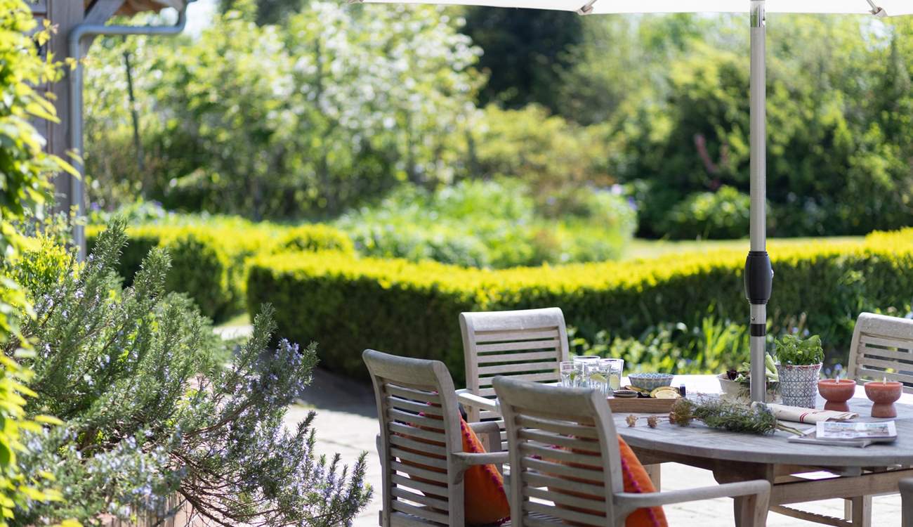 Sit amongst the beautiful borders and enjoy a relaxing meal and listen to the surrounding rustle of the trees. 